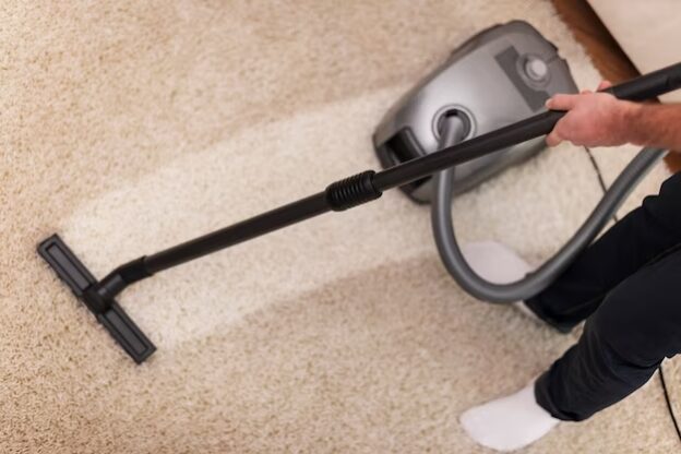 close-up-vacuuming-carpet